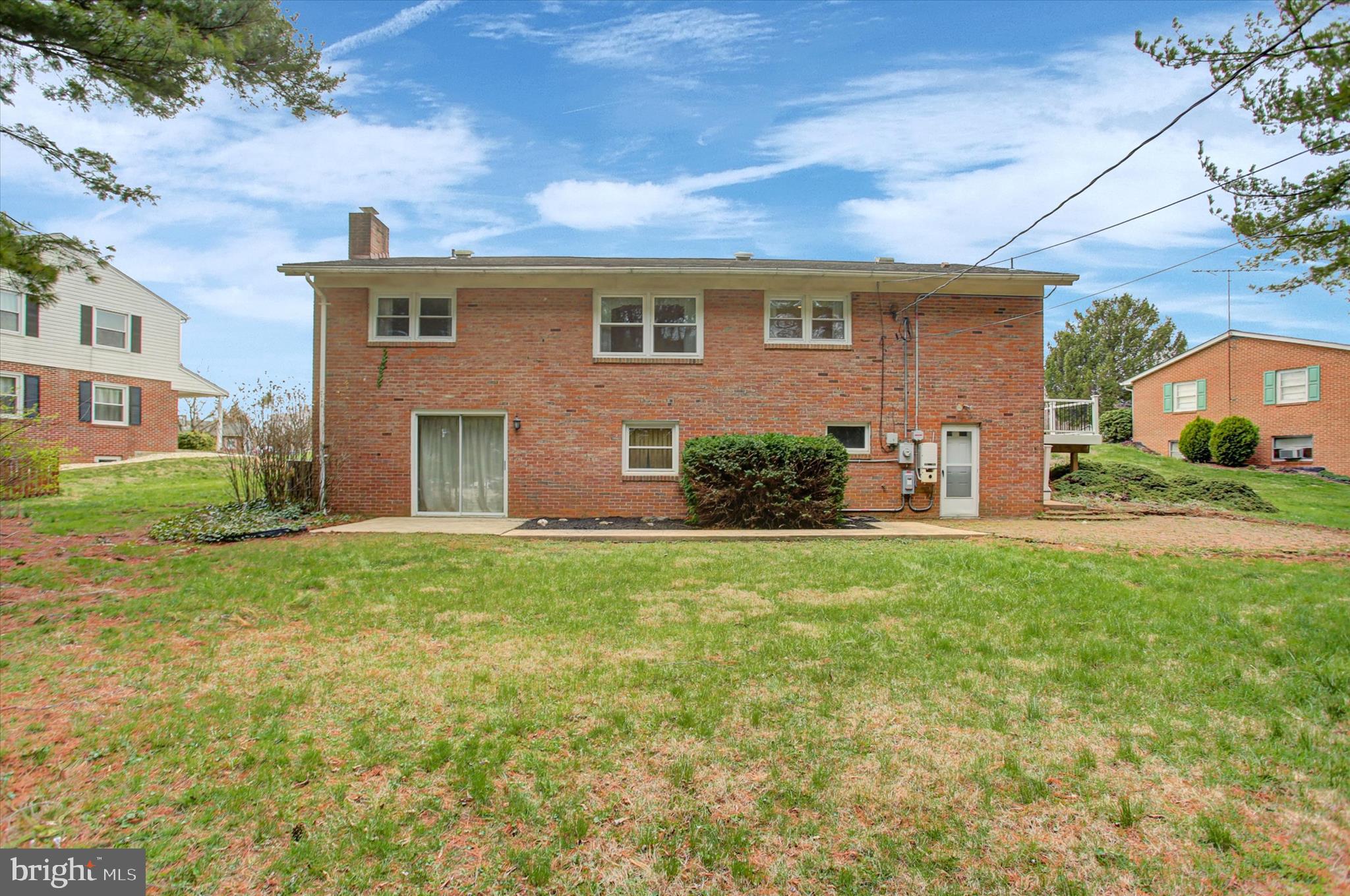 18514 Indian Cottage Road Hagerstown, MD 21742 - Photo 55 of 56 a front view of house with yard and outdoor seating