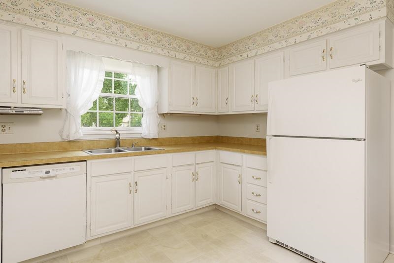 5792 Haddon Place Rockford, IL 61114 - Photo 14 of 47 a kitchen with granite countertop white cabinets and a sink