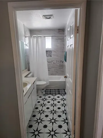 a view of gallery with wooden floor