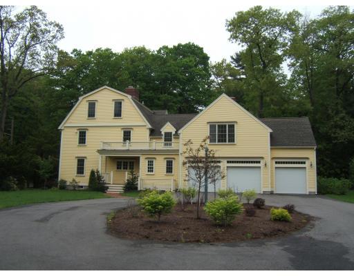 4 Ridgeway Road Wellesley, MA 02481 - Photo 8 of 16 a front view of a house with garden