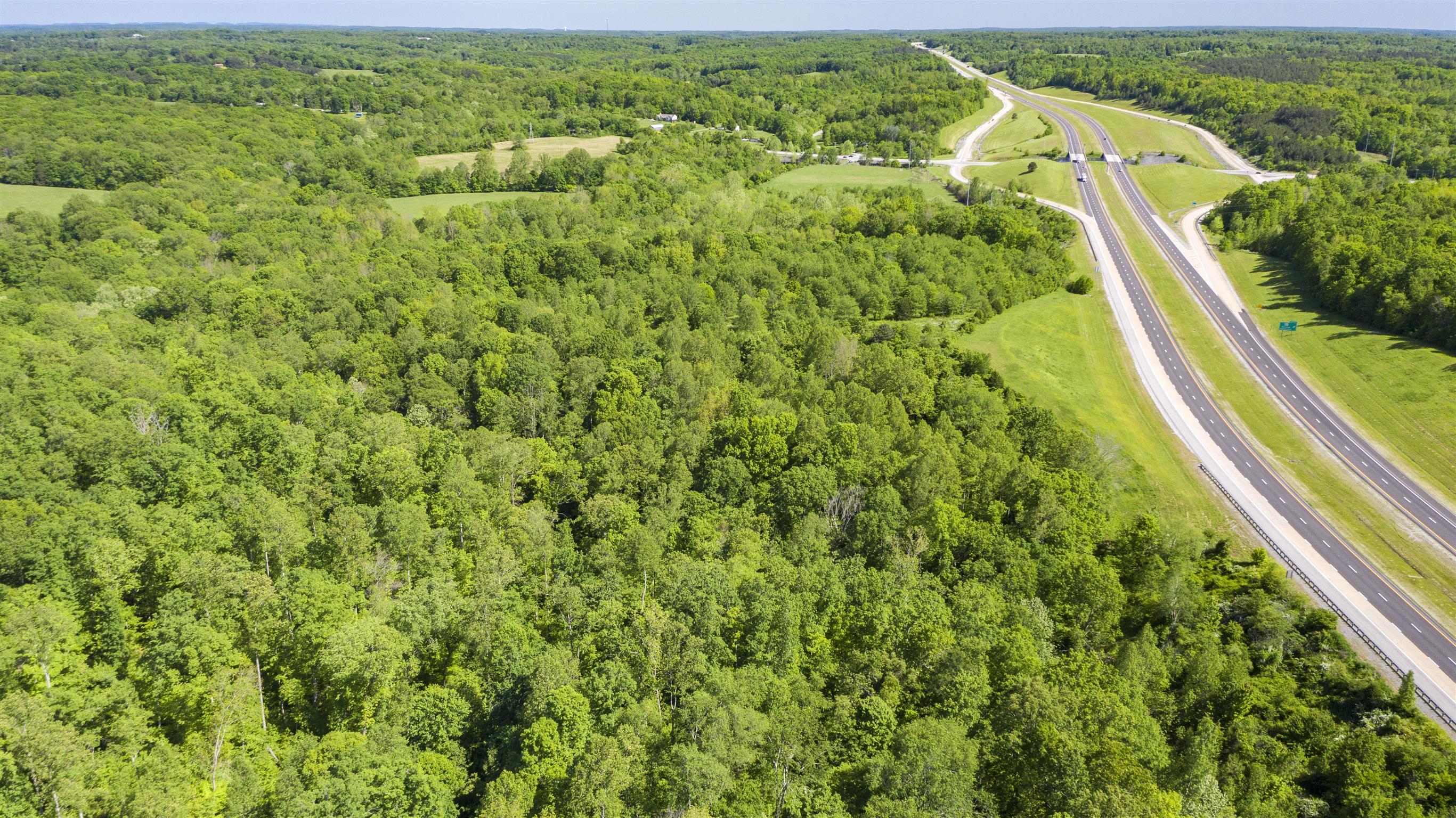 0 Highway 100 Fairview, TN 37062 - Photo 11 of 11 an aerial view of residential houses with outdoor space and trees
