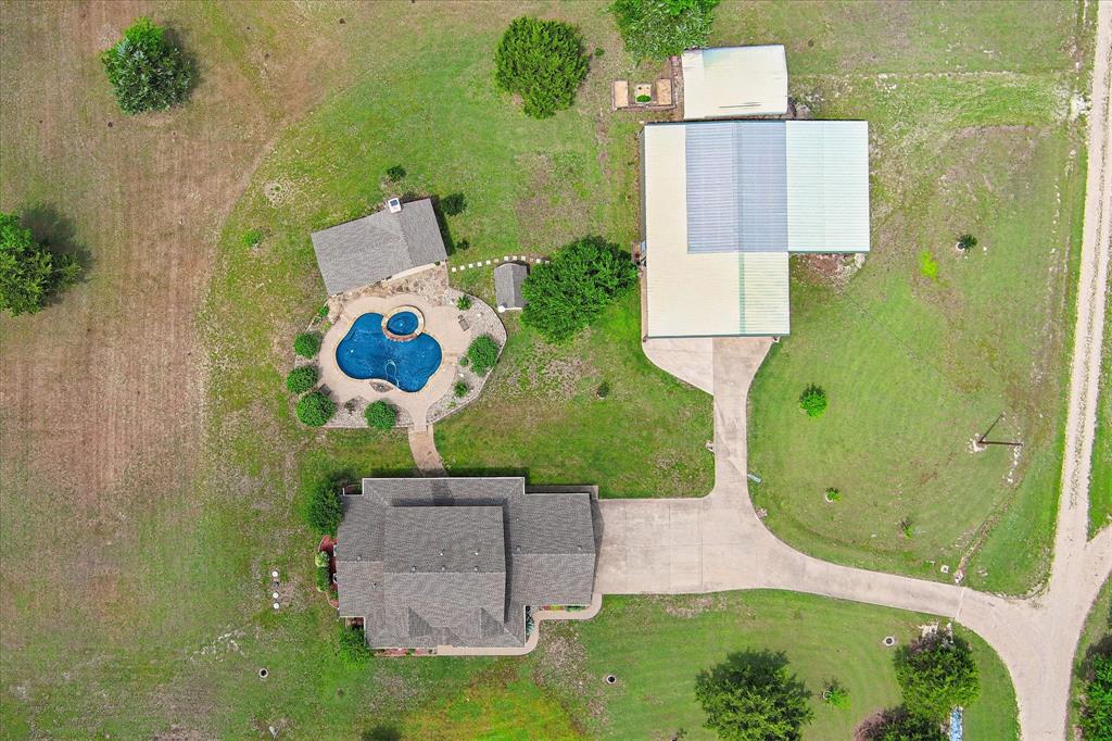 6251 Hayes Road Midlothian, TX 76065 - Photo 20 of 30 an aerial view of a house with a swimming pool