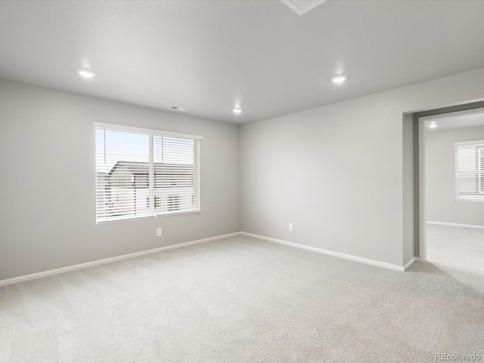 4674 Rabbitbrush Street Johnstown, CO 80534 - Photo 15 of 29 an empty room with a window