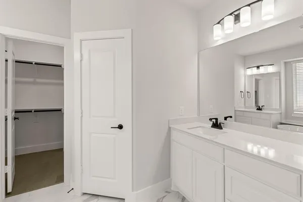 a view of an empty walk in closet