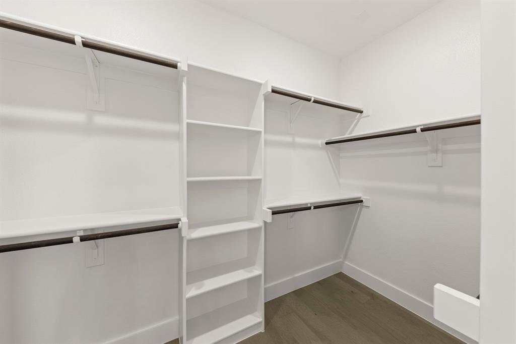 1317 Flamingo Road Forney, TX 75126 - Photo 16 of 39 a view of an empty walk in closet
