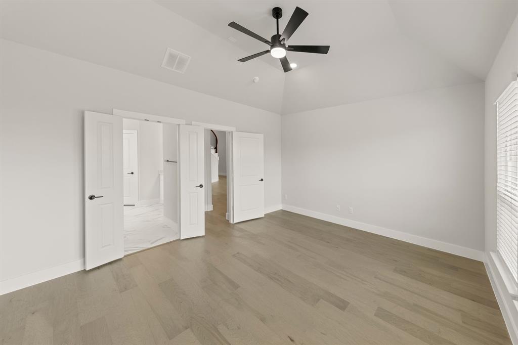 1317 Flamingo Road Forney, TX 75126 - Photo 9 of 39 wooden floor in an empty room
