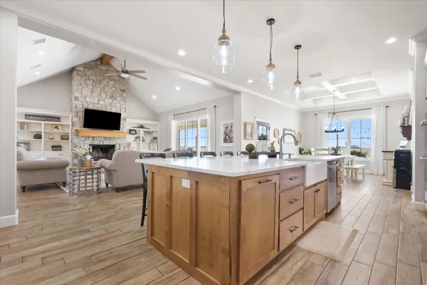 a kitchen with stainless steel appliances a refrigerator and a microwave