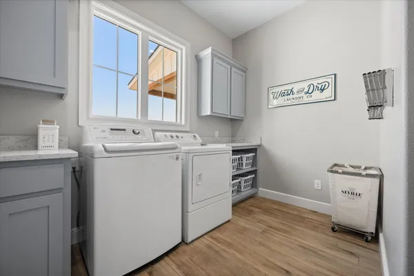 a bathroom with a granite countertop sink a toilet and bathtub