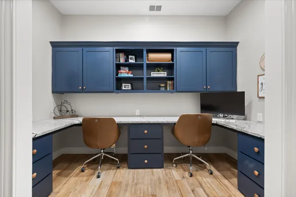 a house with yard in front of it