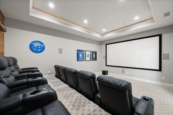 a house with a yard and a large parking space