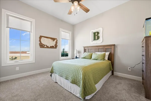 a view of house with outdoor space and parking