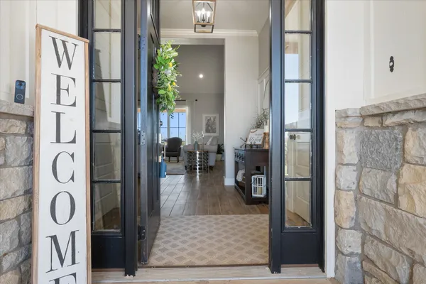 a living room with fireplace furniture and a flat screen tv