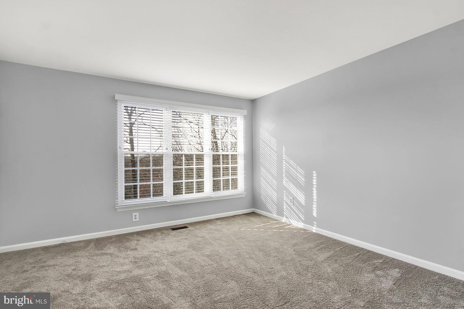4418 Cole Farm Road Baltimore, MD 21236 - Photo 13 of 24 Master bedroom offers natural lighting