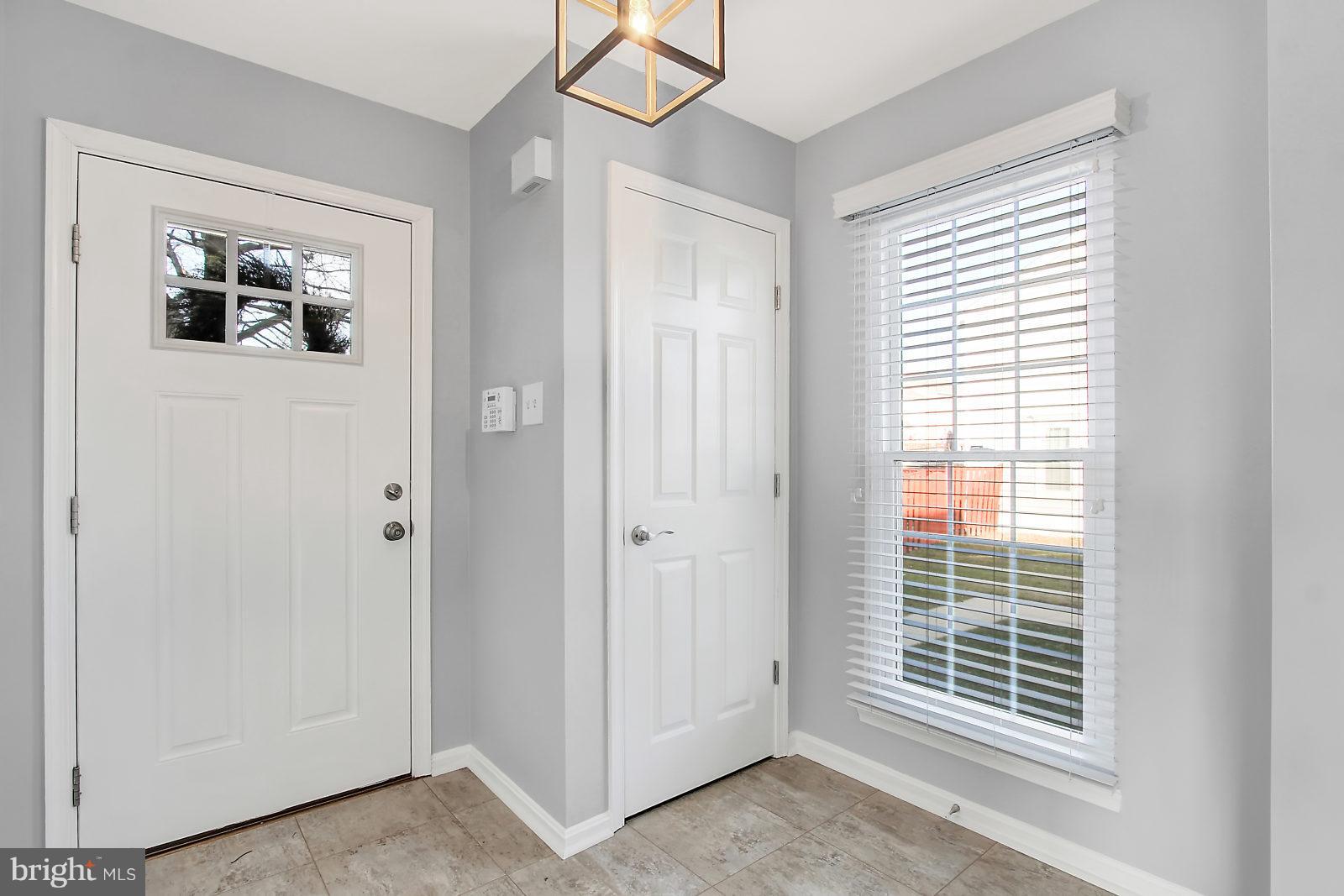 4418 Cole Farm Road Baltimore, MD 21236 - Photo 4 of 24 Foyer w/alarm- closet &opp.side is guest 1/2 bath