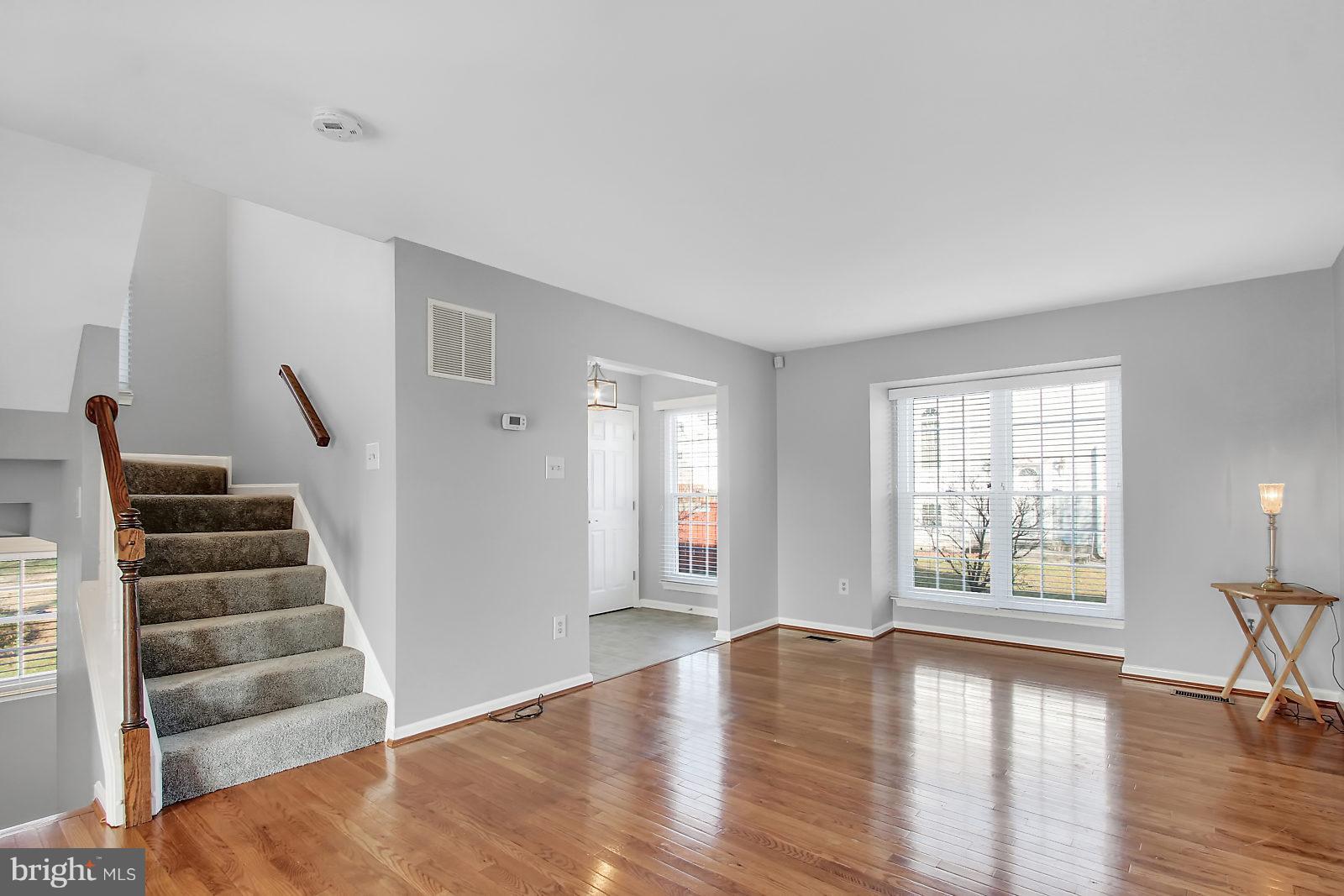 4418 Cole Farm Road Baltimore, MD 21236 - Photo 7 of 24 Large lv. rm with floor to ceiling windows