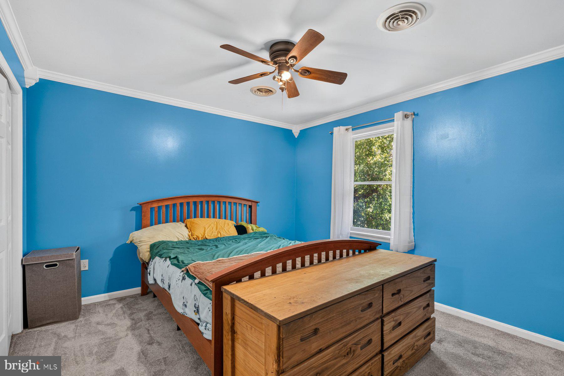 49 Rockland Road Westminster, MD 21158 - Photo 55 of 66 a very nice looking bedroom with a large window and a ceiling fan