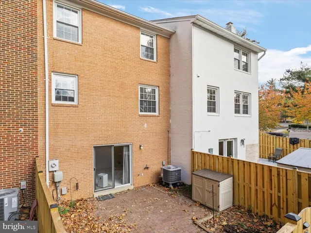 a front view of a house with parking space