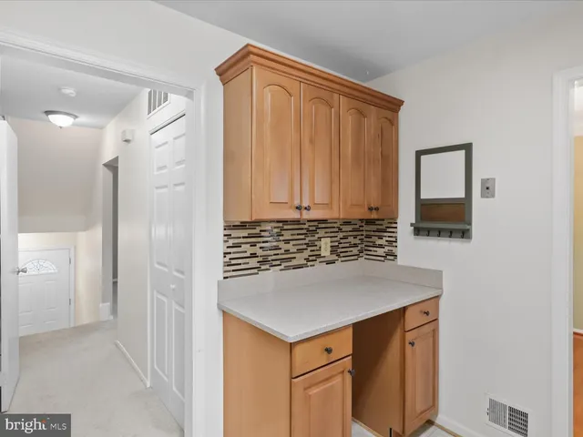 a bathroom with a shower and a sink