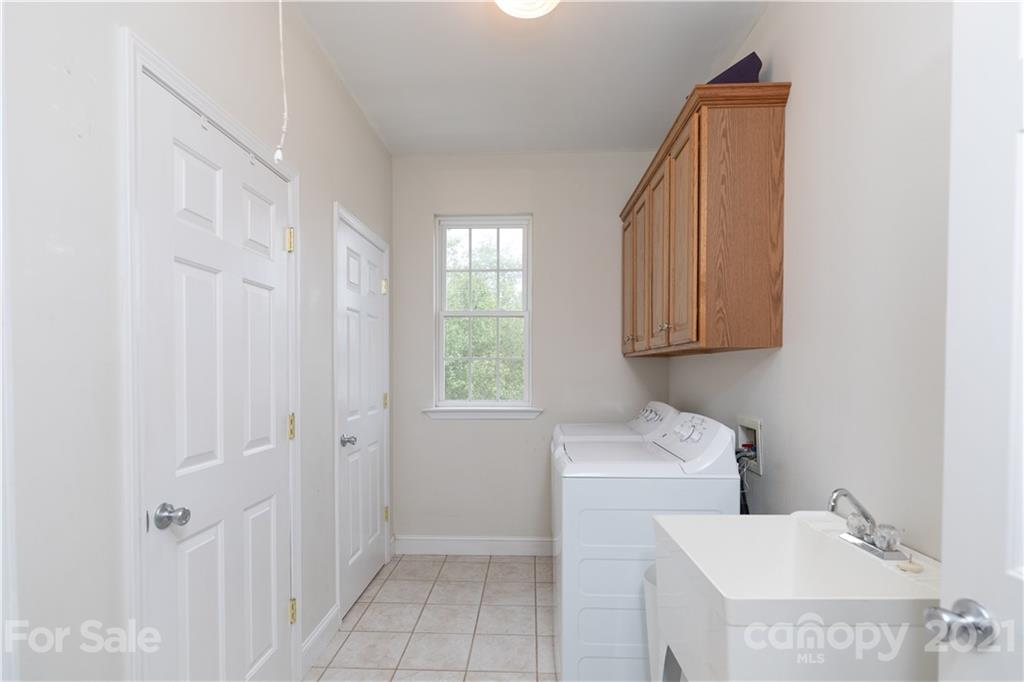 196 Cedar Grove Road York, SC 29745 - Photo 21 of 45 a utility room with dryer and washer