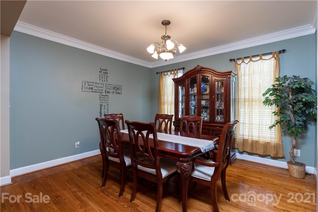 196 Cedar Grove Road York, SC 29745 - Photo 7 of 45 a view of a dining room with furniture window and wooden floor