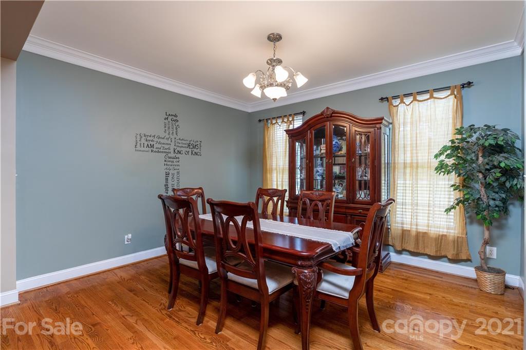 196 Cedar Grove Road York, SC 29745 - Photo 8 of 45 a view of a dining room with furniture window and wooden floor