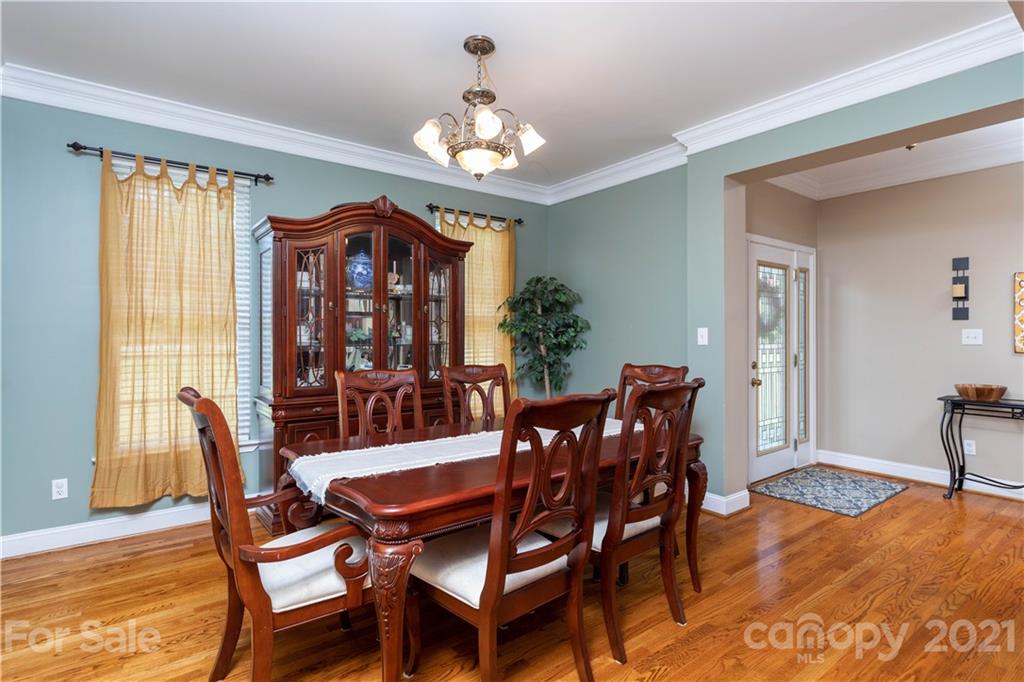 196 Cedar Grove Road York, SC 29745 - Photo 9 of 45 a view of a dining room with furniture window and wooden floor