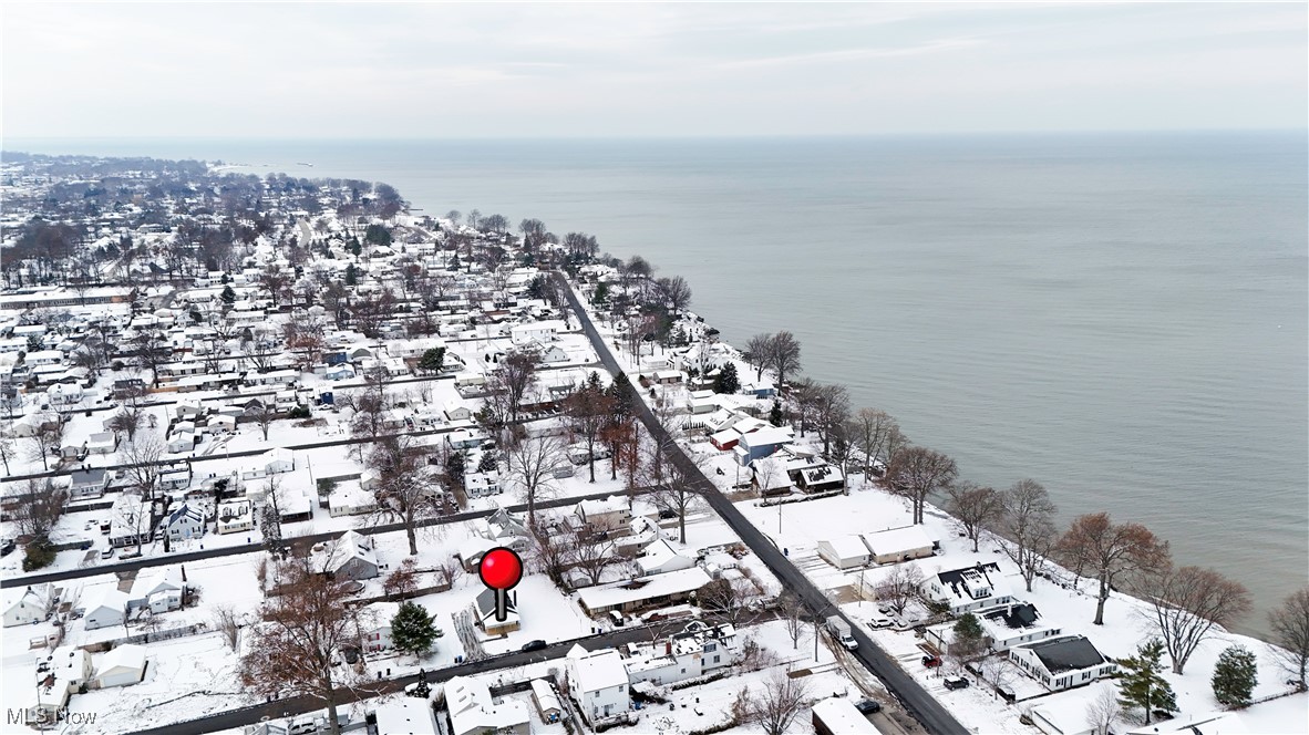 218 Roxboro Road Vermilion, OH 44089 - Photo 46 of 50 Aerial perspective of suburban area with a large body of water