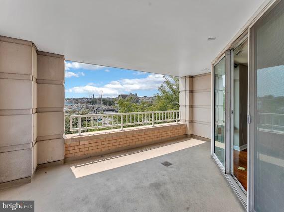 100 Harborview Drive, Unit 202 Baltimore, MD 21230 - Photo 2 of 25 a view of a room with floor to ceiling windows