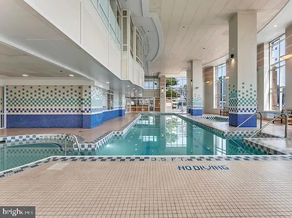 a view of a swimming pool and deck