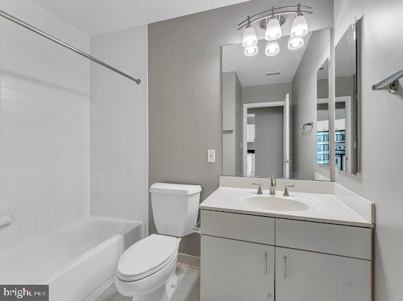 100 Harborview Drive, Unit 202 Baltimore, MD 21230 - Photo 6 of 25 a bathroom with a toilet a sink and a large mirror