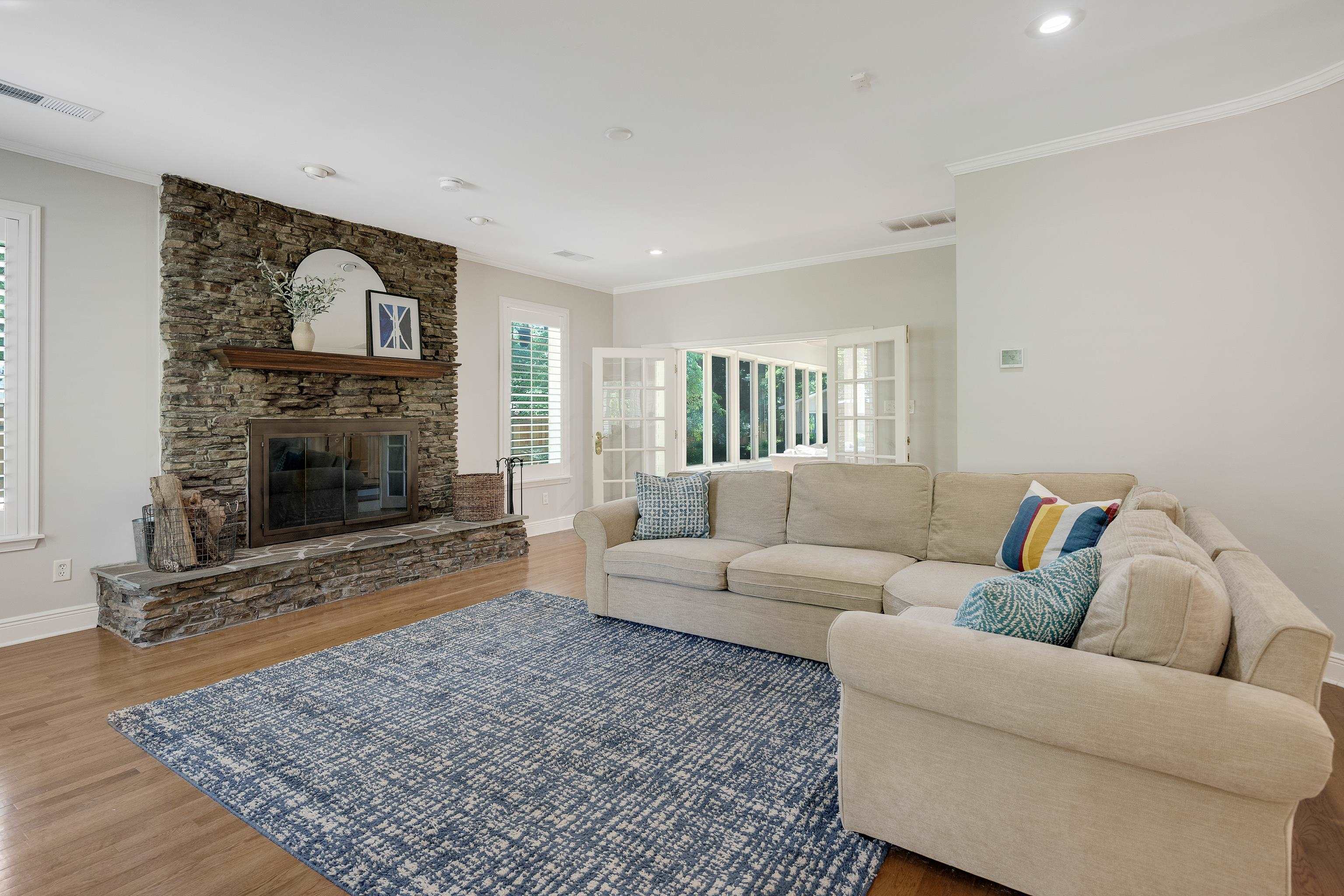 4959 Roane Road Memphis, TN 38117 - Photo 7 of 25 a living room with furniture and a fireplace