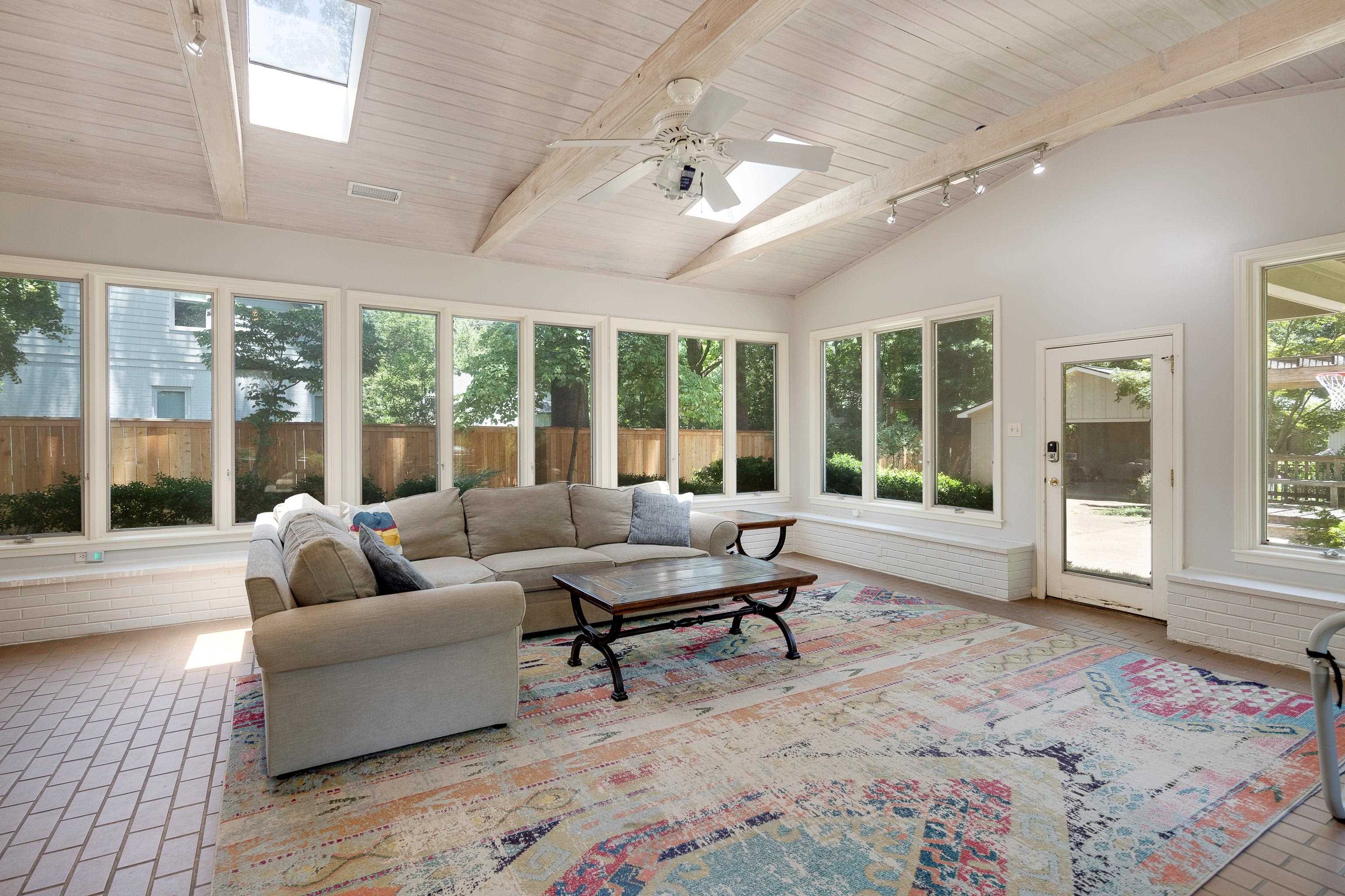4959 Roane Road Memphis, TN 38117 - Photo 8 of 25 a living room with furniture and large windows