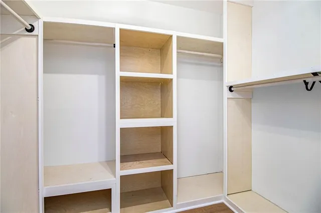 a bathroom with a glass door shower