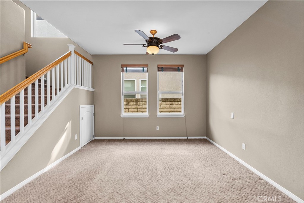 25558 Fitzgerald Avenue Stevenson Ranch, CA 91381 - Photo 12 of 55 wooden floor in an empty room with a window