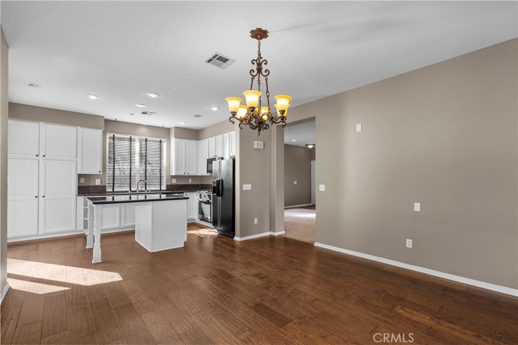 25558 Fitzgerald Avenue Stevenson Ranch, CA 91381 - Photo 21 of 55 a view of kitchen with refrigerator and window