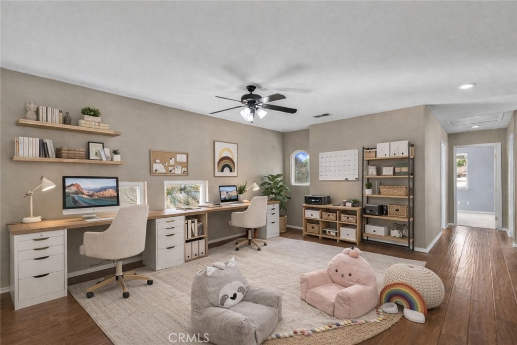 25558 Fitzgerald Avenue Stevenson Ranch, CA 91381 - Photo 28 of 55 a living room with furniture and wooden floor