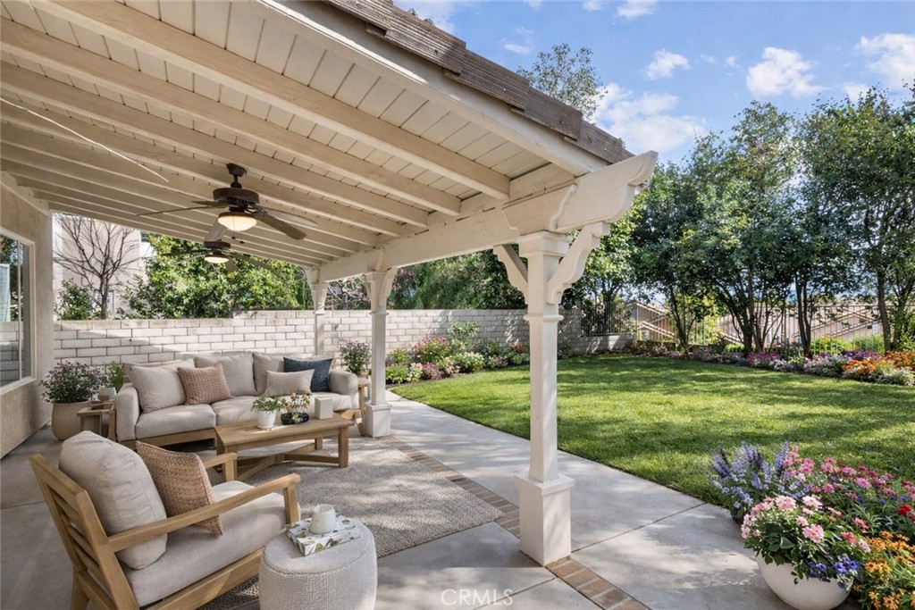 25558 Fitzgerald Avenue Stevenson Ranch, CA 91381 - Photo 46 of 55 a patio with yard table and chairs