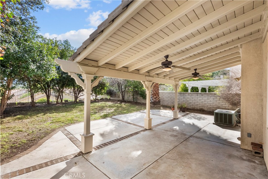 25558 Fitzgerald Avenue Stevenson Ranch, CA 91381 - Photo 49 of 55 a view of a backyard with a patio