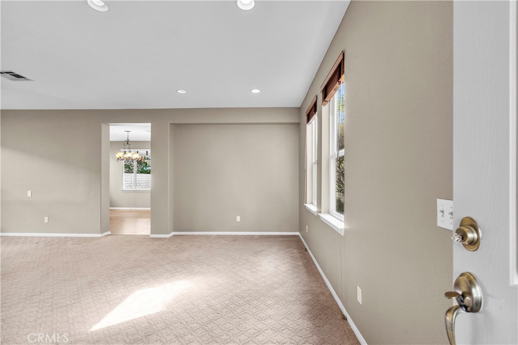 25558 Fitzgerald Avenue Stevenson Ranch, CA 91381 - Photo 5 of 55 an empty room with windows and closet
