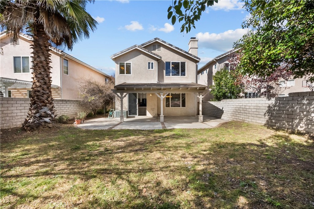25558 Fitzgerald Avenue Stevenson Ranch, CA 91381 - Photo 51 of 55 a front view of a house with swimming pool