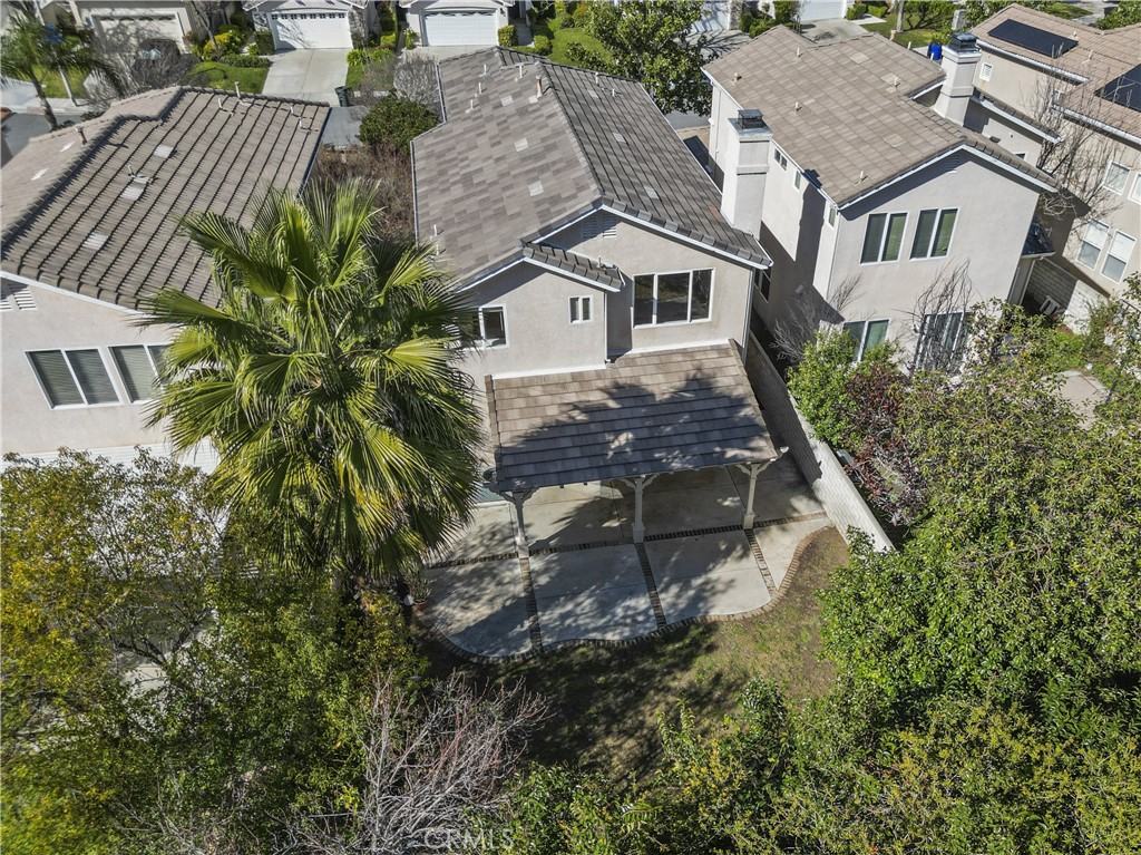 25558 Fitzgerald Avenue Stevenson Ranch, CA 91381 - Photo 52 of 55 an aerial view of a house with a yard