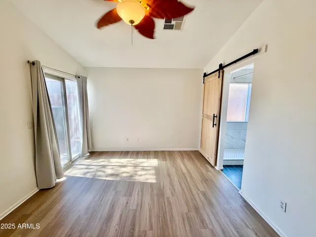 a bathroom with a double vanity sink toilet and shower