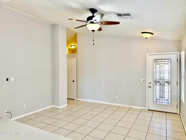 a view of an empty room and window