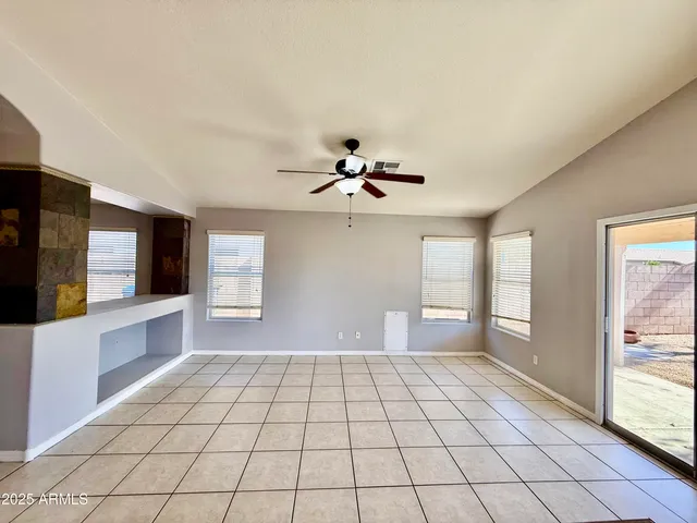 a view of an empty room and window