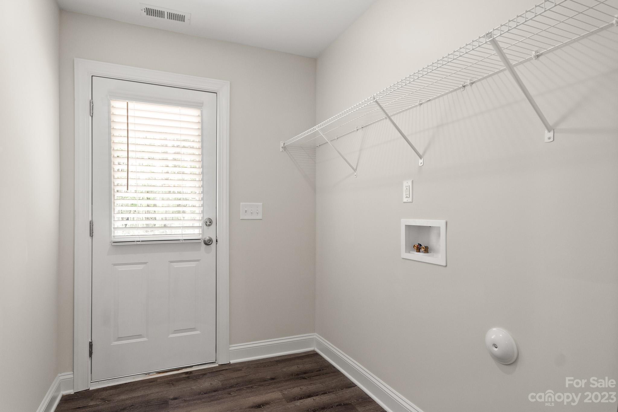 318 Springhill Lane Maiden, NC 28650 - Photo 17 of 40 a view of room with window and wooden floor