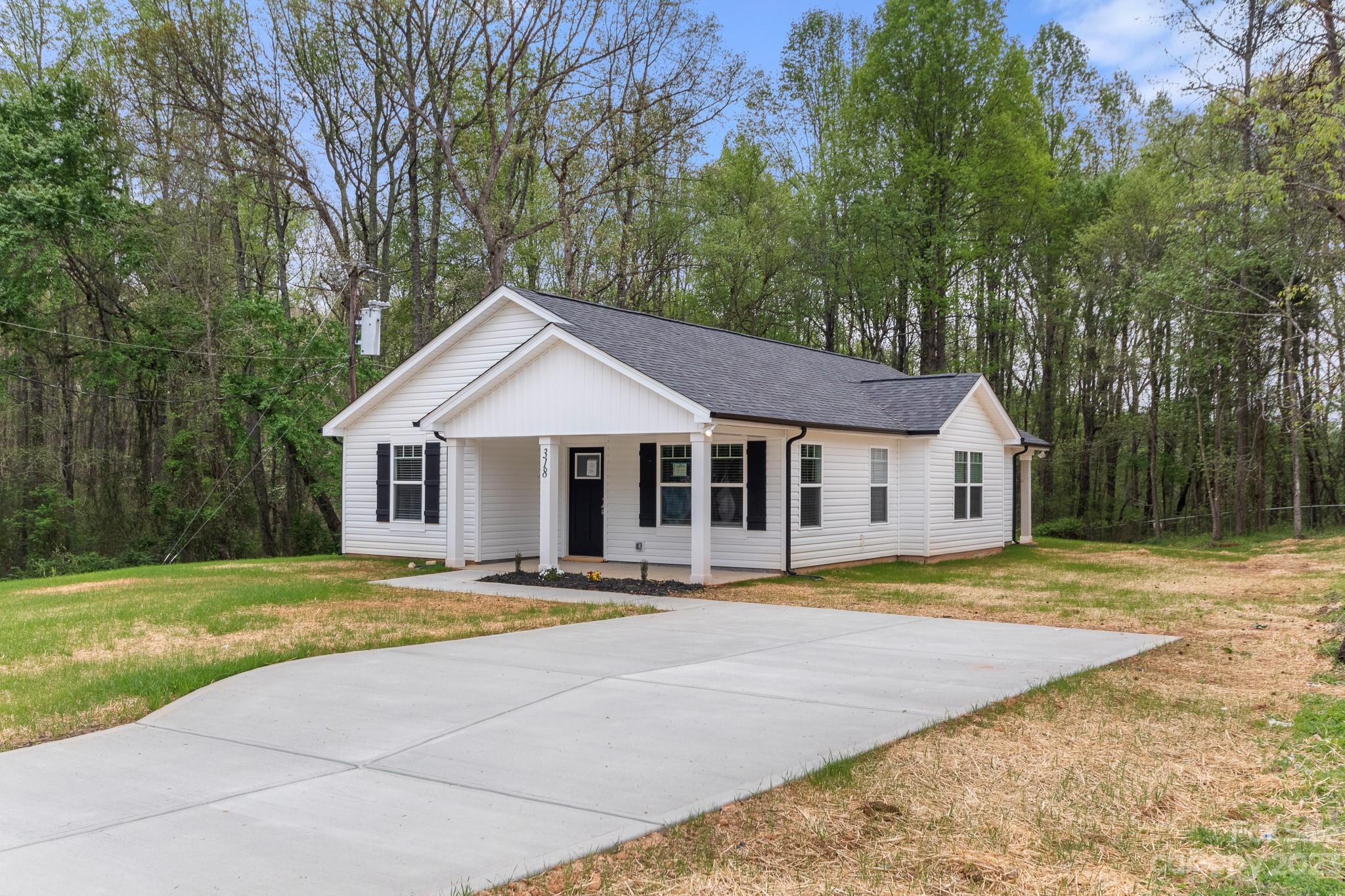 318 Springhill Lane Maiden, NC 28650 - Photo 2 of 40 a front view of a house with a yard