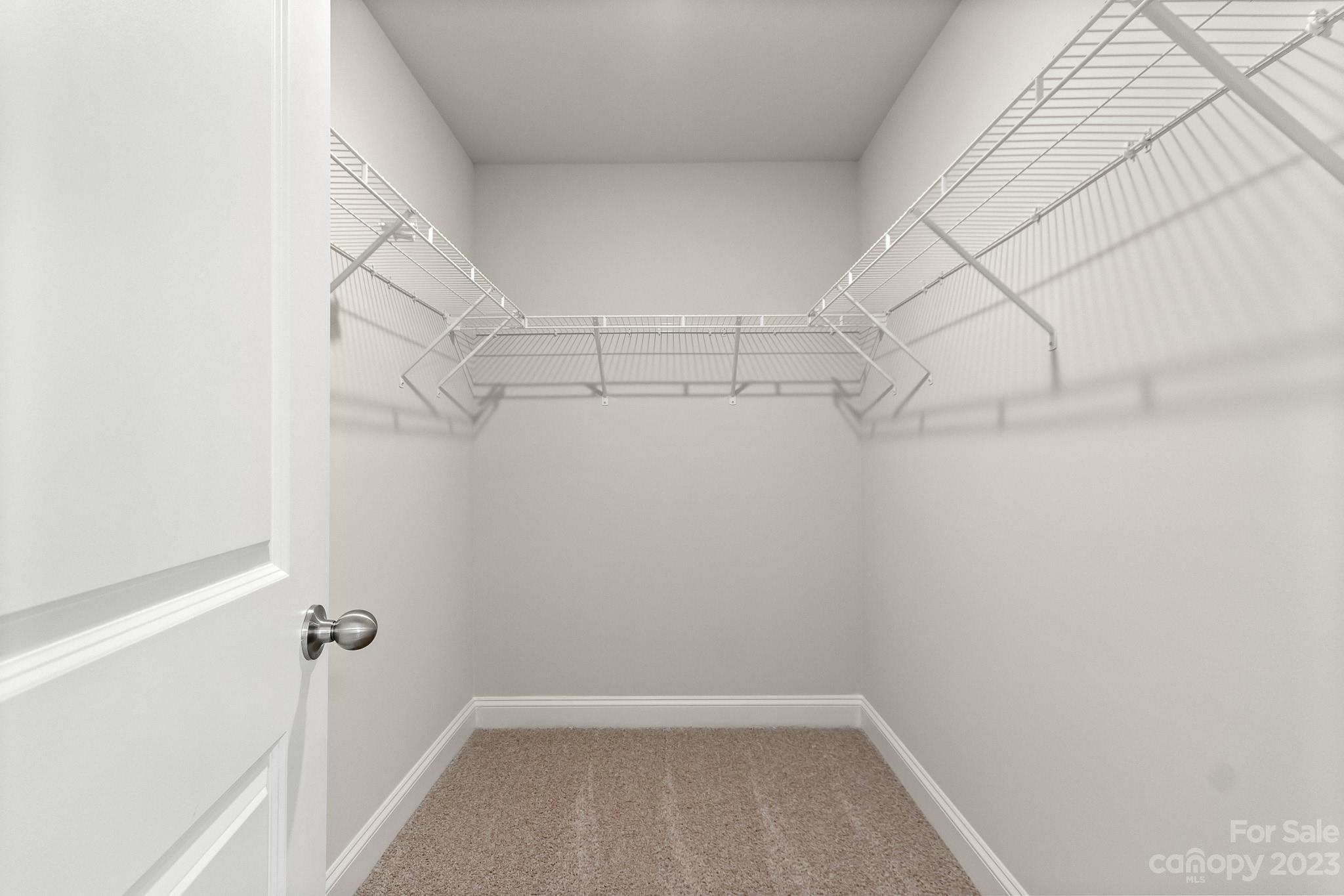 318 Springhill Lane Maiden, NC 28650 - Photo 21 of 40 a view of a room with racks on the wall