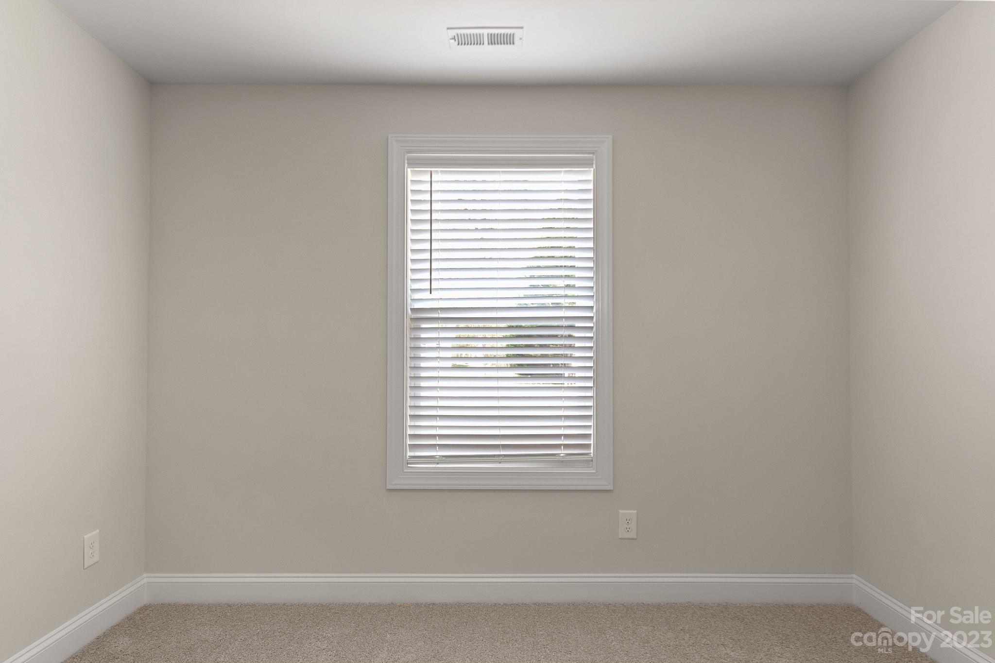 318 Springhill Lane Maiden, NC 28650 - Photo 27 of 40 a bathroom with a window and a shower