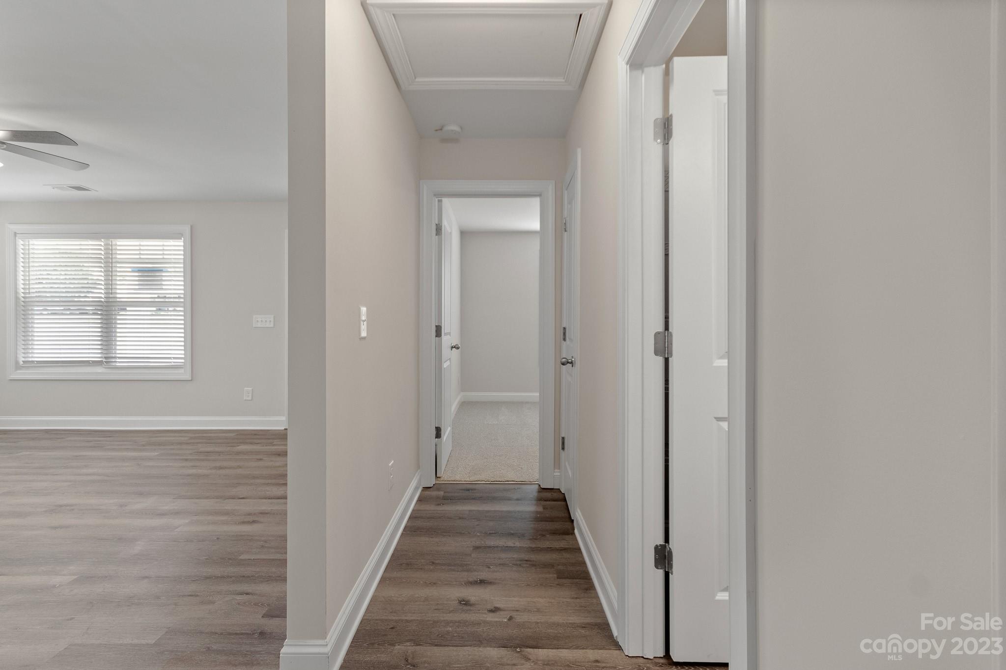 318 Springhill Lane Maiden, NC 28650 - Photo 29 of 40 a view of a hallway with wooden floor and closet