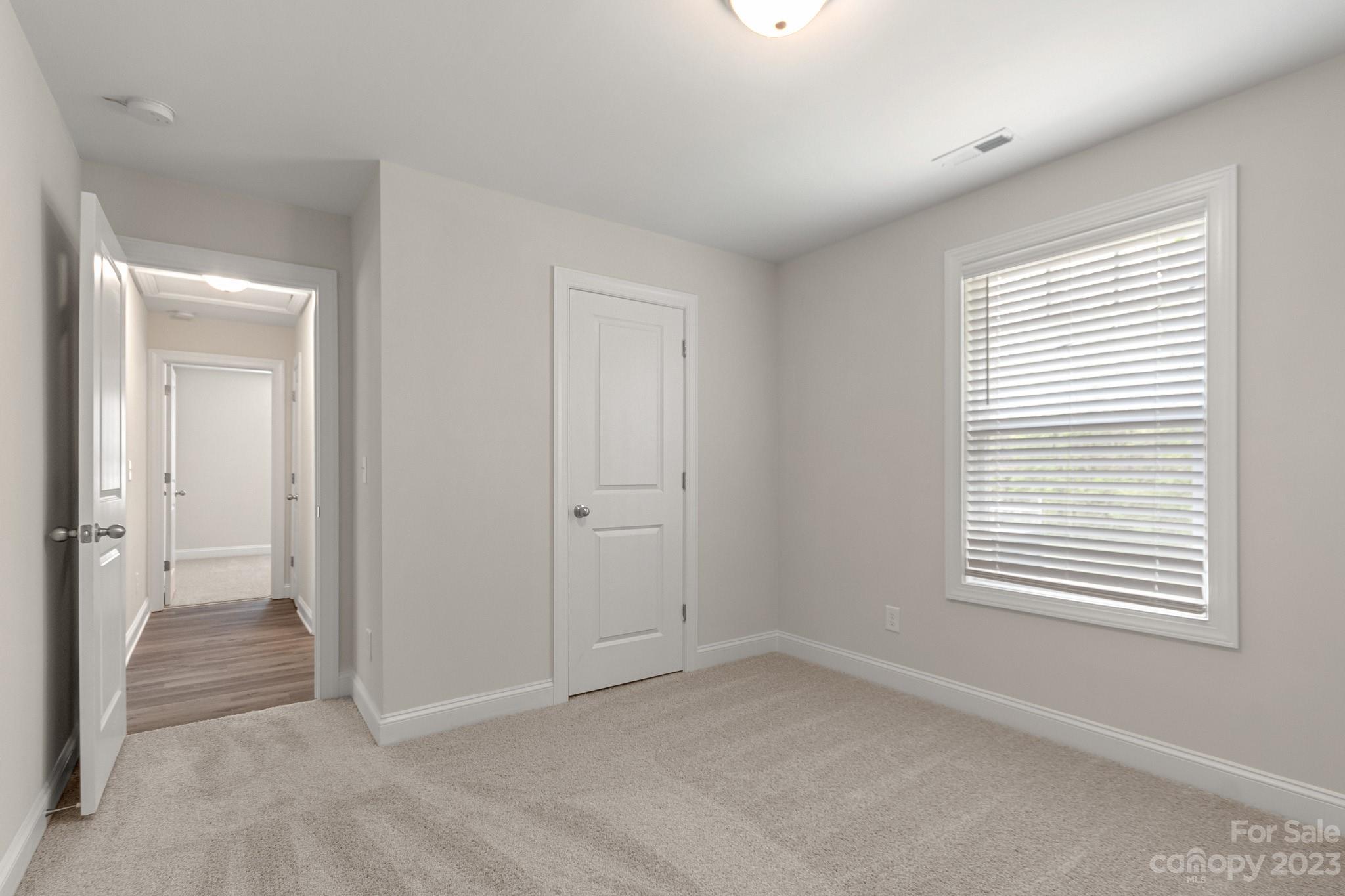 318 Springhill Lane Maiden, NC 28650 - Photo 34 of 40 a view of an empty room with a window